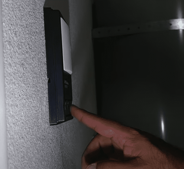 Press and Hold the Garage Door Button