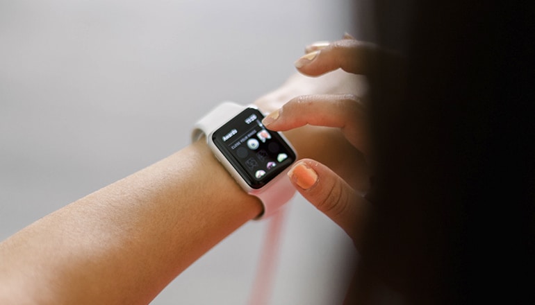 A Person Using an Apple Watch